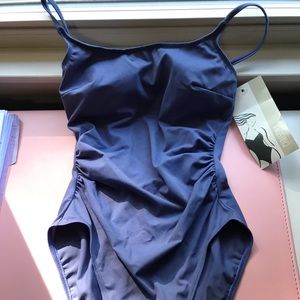 Christina- one piece bathing suit.